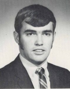 Donald Davis is pictured in a suit and tie for his senior yearbook photo